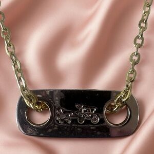COACH gold tone horse and carriage necklace 18”